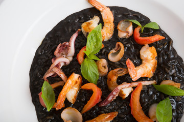 Black risotto with seafood