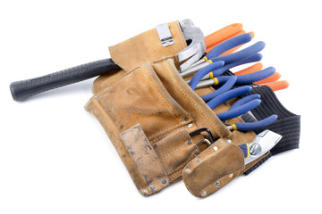 set of tools in construction's belt