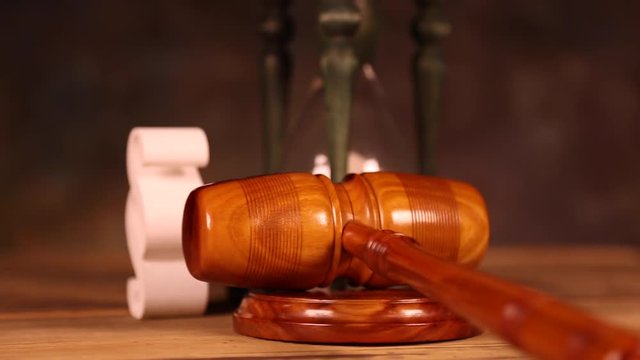 Law theme, mallet of judge, wooden gavel