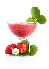 Fresh strawberries with goblet,leaves,flower on white