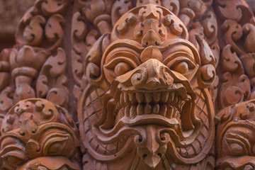 Bas relief carvings Cambodian god idol statue close up