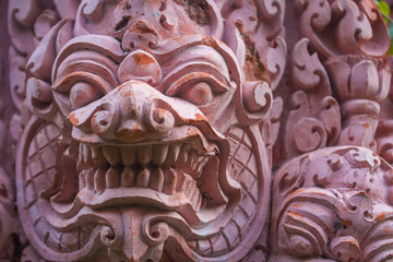 Bas relief carvings Cambodian god idol statue close up