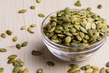 pumpkin seeds in a glass bowl