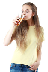 Beautiful woman with a glass of juice, isolated on white