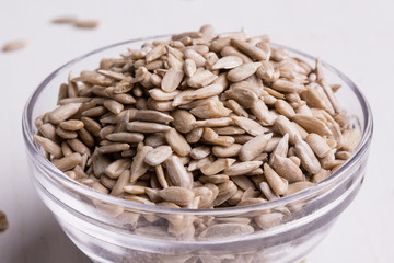 sunflower seeds in a glass bowl
