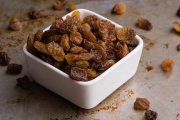 raisins in a white bowl