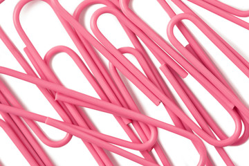 close up image of pink paper clips