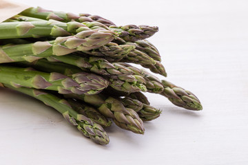 asparagus on white table
