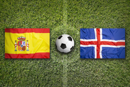 Spain vs. Iceland flags on soccer field