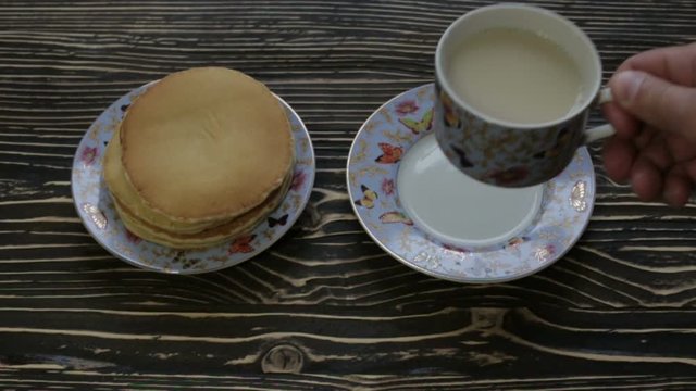 Hot tea with pancakes