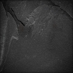 Dark grey black slate background or texture.