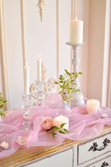 Fototapeta na wymiar wedding candles and flowers on table 