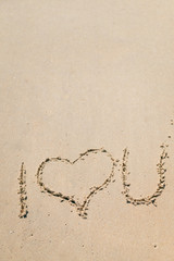 I love you draw on the outside sand beach background