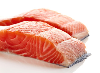 Fresh raw salmon fillet isolated on white