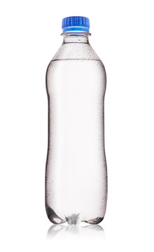 White bottle of mineral water with drops
