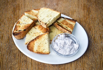 greek bread with olive oil and yoghurt sauce