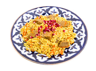 Fragrant pilaf with meat and dried apricots.