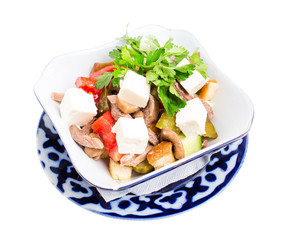 Delicious salad with veal tongue and champignons.