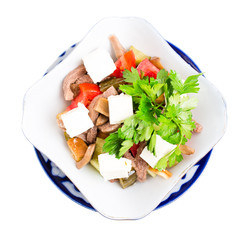 Delicious salad with veal tongue and champignons.