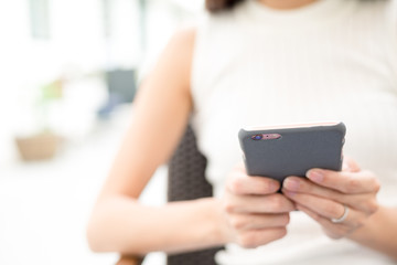 Woman browse internet on cellphone