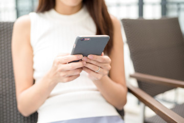 Woman browse internet on cellphone