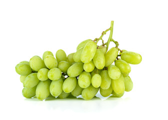 bunch of ripe and juicy green grapes close-up on a white backgro