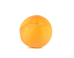One ripe peach on white background