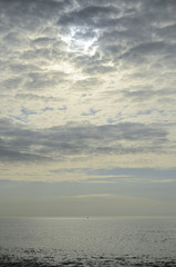 vertical landscape, clouds, sky and sea