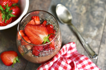 Chocolate chia seed pudding with strawberry.