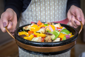 Serving Brasied mixed pepper salad