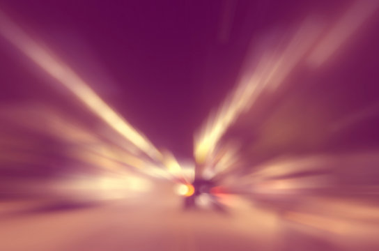 Motion blur traffic road in city night abstract background.