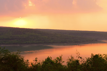 Fototapeta na wymiar Beautiful sunset over lake at Lam Ta Khong Reservoir