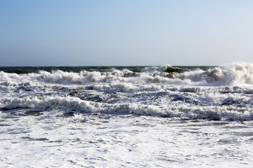 The waves of the Pacific ocean, the beach landscape. The ocean and waves during strong winds in United States, Santa Monica.