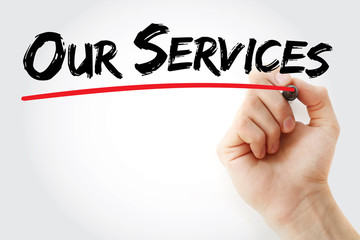 Hand writing Our Services with marker, business concept background