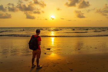 the tourist Watching the sunset