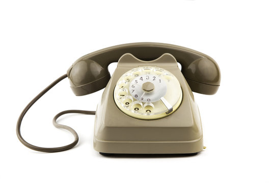 isolated vintage italian telephone / portrait of old - vintage telephone in white background