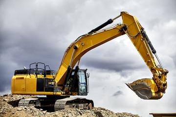 Constuction industry excavator heavy equipment on the job