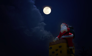 Statue of Santa Claus climbing down the chimney