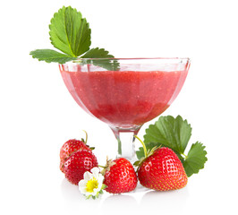 Fresh strawberries with goblet,leaves,flower on white