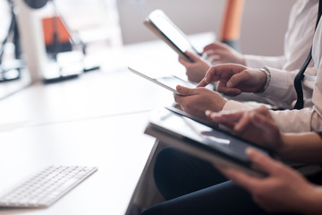 Fototapeta premium business people on meeting using tablet