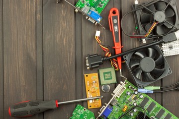 Table electronics repairman. Home computer repair. Desktop clutter electronics repairman. Recycling...