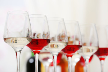Wine glasses with red and white wine, closeup