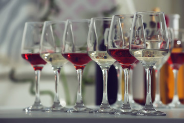 Wine glasses with red and white wine, closeup