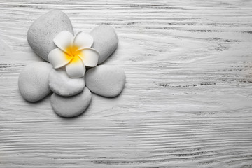 Beautiful spa composition on light wooden background