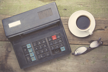 calculator and coffee