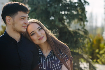 Loving young beautiful calm couple close up portrait