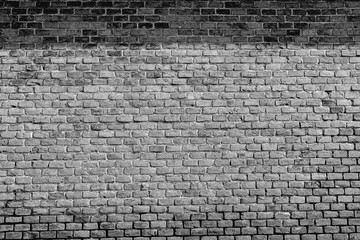 old black and white brick wall with shadow