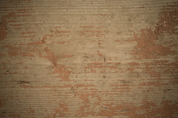 Background of old wooden boards with traces of paint. Toned