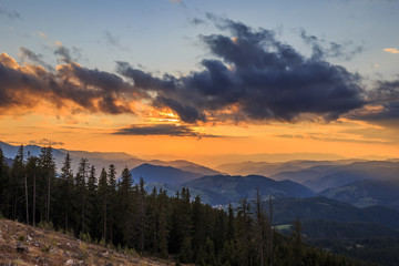 Fototapeta na wymiar Dramatic mountain view on sunset time