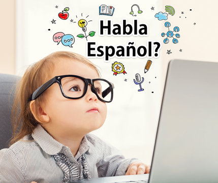 Habla Espanol concept with toddler girl